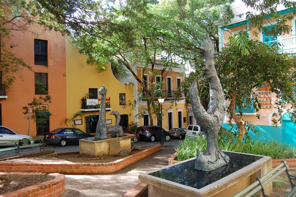 Leafy square surrounded by colorful, colonial architecture in Old San Juan, Puerto Rico